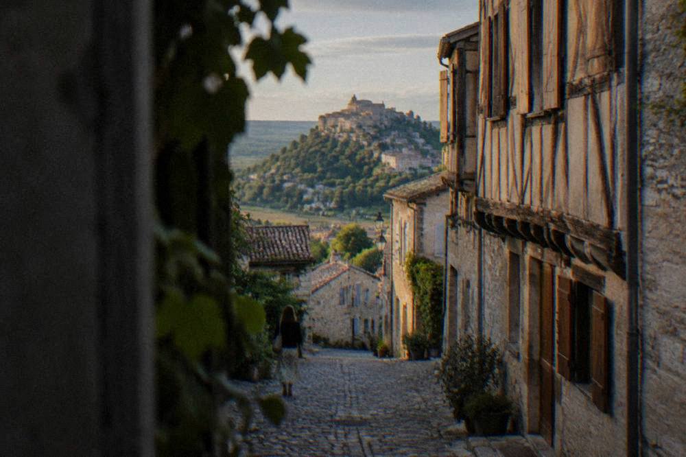 A medieval village street of half-timbered houses in a small town in southwestern France