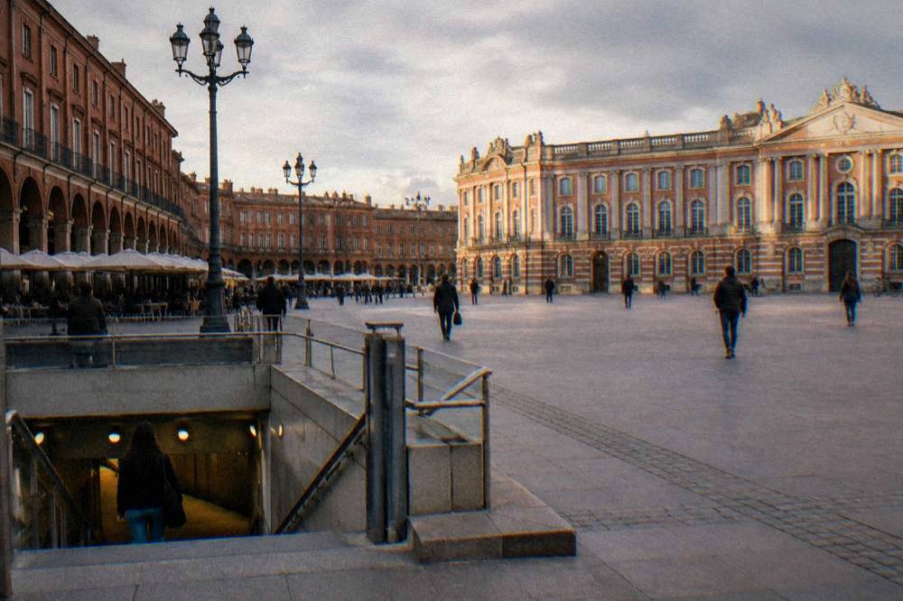 A Toulouse metro station entrance with the Tisseo sign above it