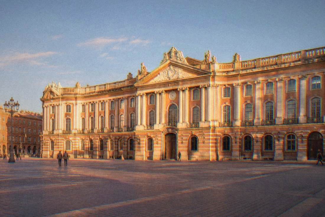 The brick facade of the Capitole on Place du Capitole