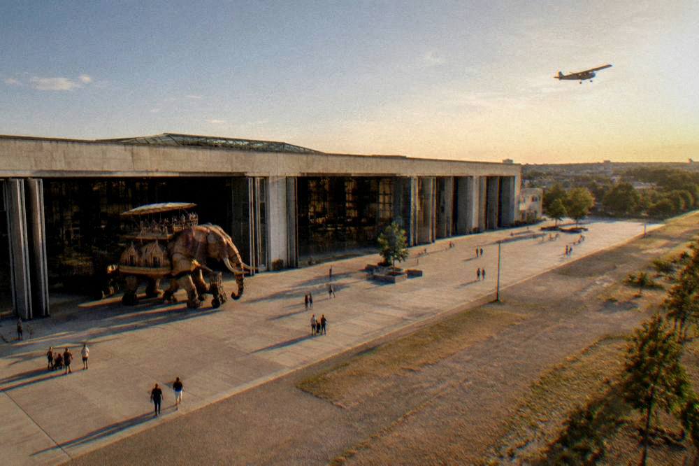 A light aircraft silhouetted against a warm evening sky over an airfield near Toulouse