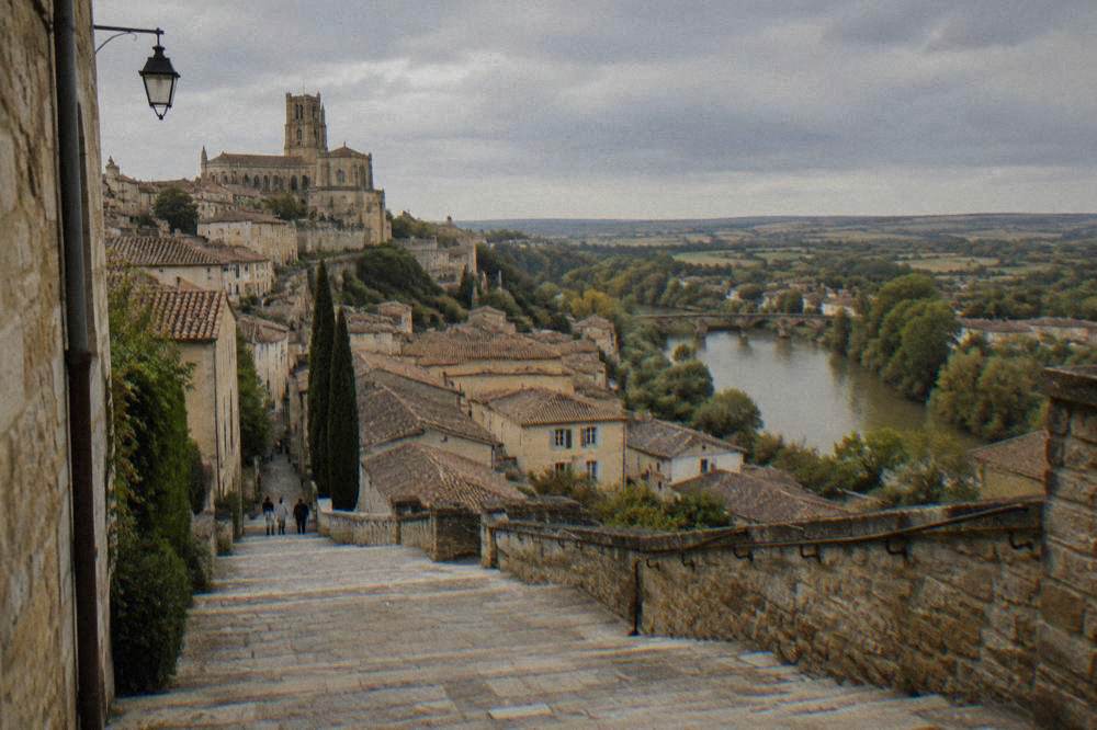The monumental staircase of Auch descending toward the river through the old town