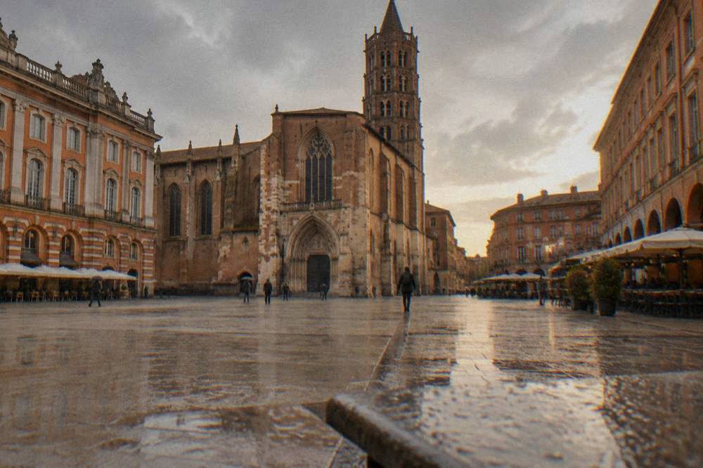 The western facade of the Cathedral of Saint-Etienne in Toulouse seen from the square