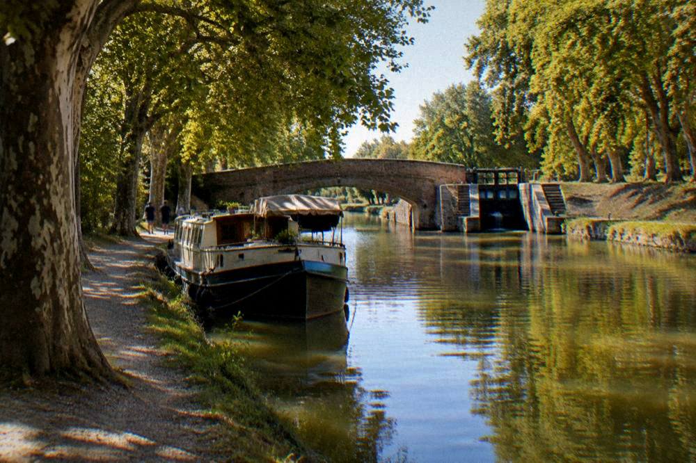 A canal boat moored on the Canal du Midi near Toulouse