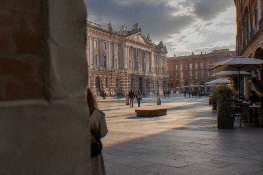 The Place du Capitole in Toulouse seen from a side street in early morning light