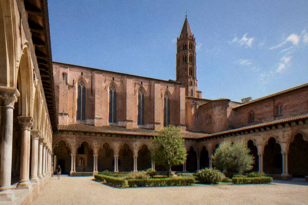 The cloister of the Couvent des Jacobins in Toulouse with stone arches