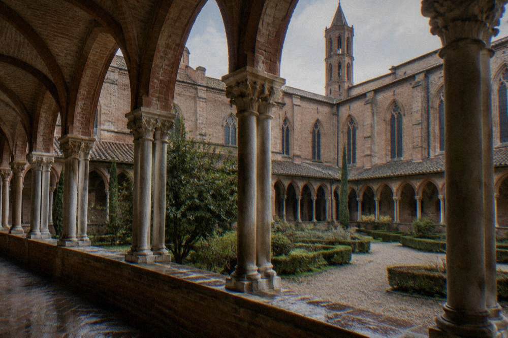 The cloister of the Couvent des Jacobins in Toulouse with brick arches