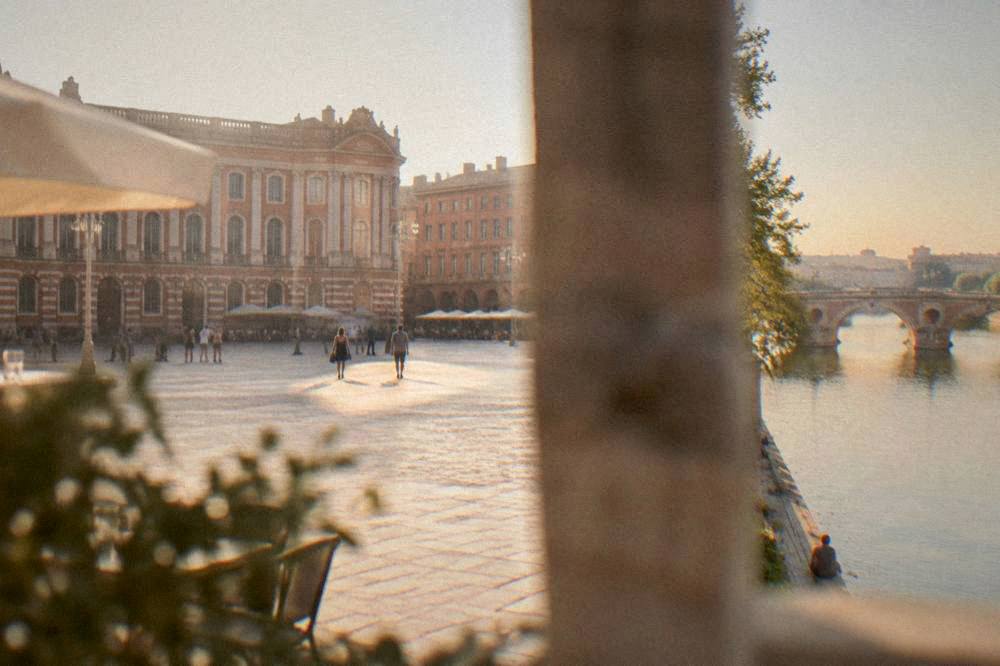 The Garonne river in Toulouse at sunset with the Pont-Neuf in view