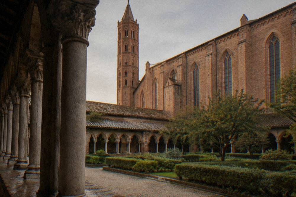 Pink brick facade of the Couvent des Jacobins church in Toulouse
